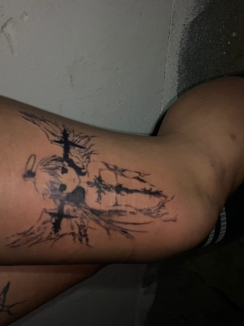 Cross composition with ornamental fragments on the upper arm, fresh