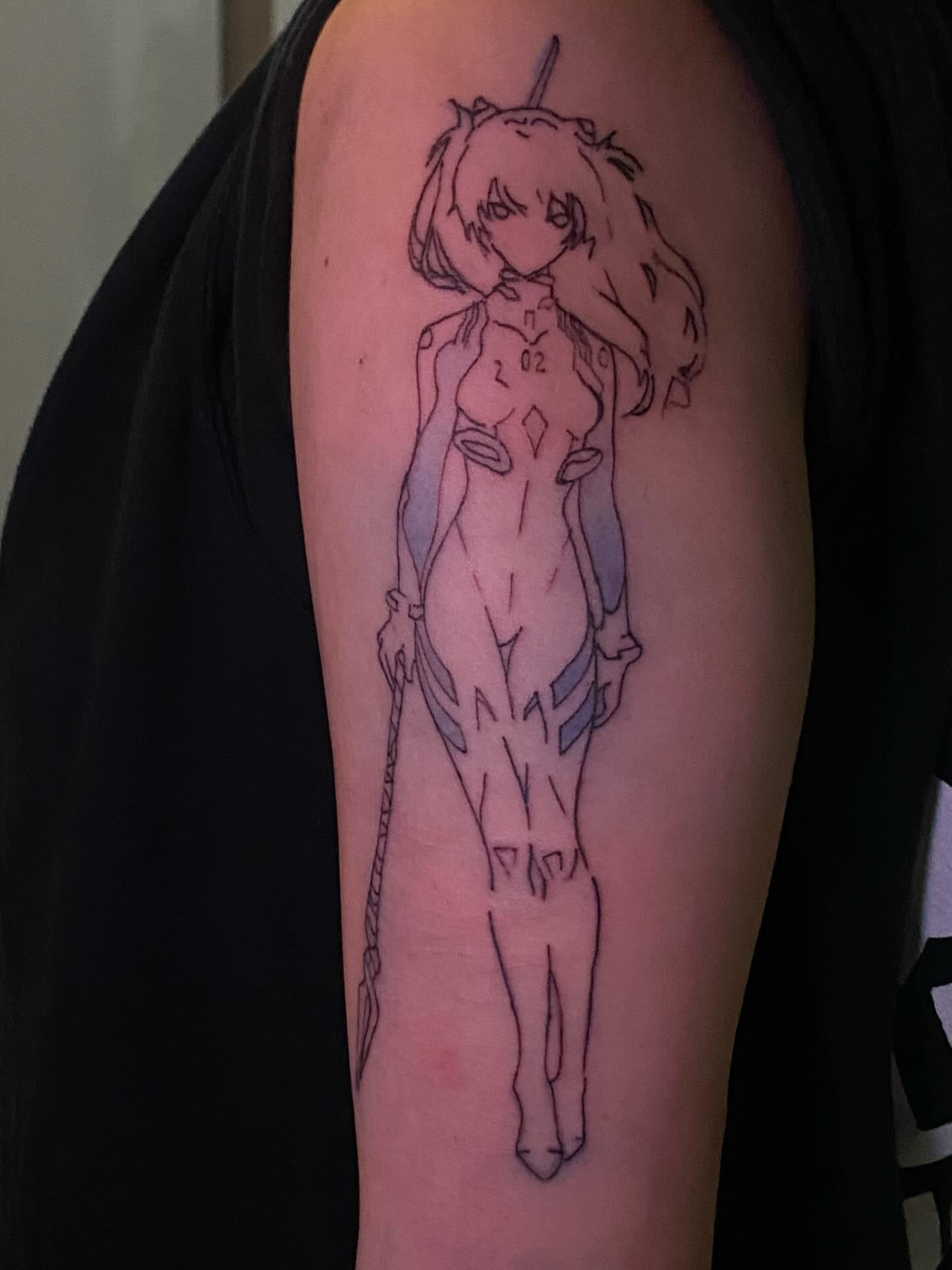 Evangelion pilot outline on the upper arm, daylight