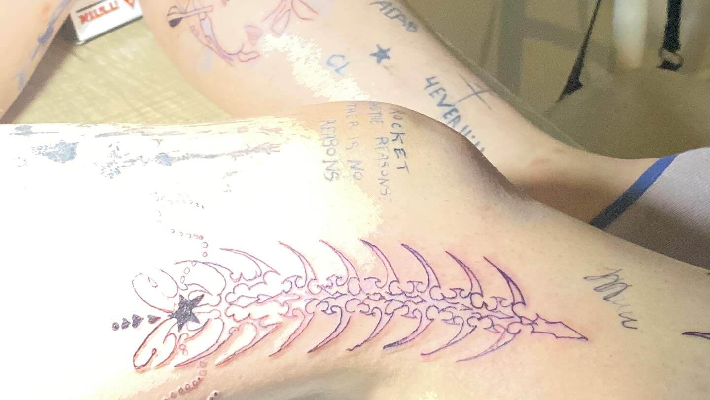 Vertebral piece along the shin with micro-lettering, in progress