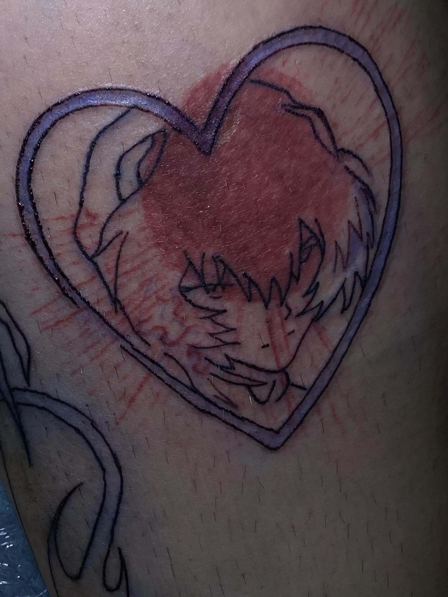Heart with anime face, close view, stencil still visible