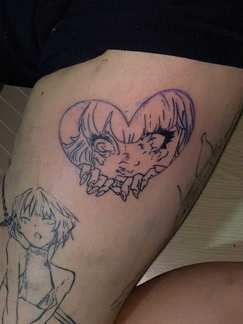 Spiked heart with two anime figures on the thigh, fresh