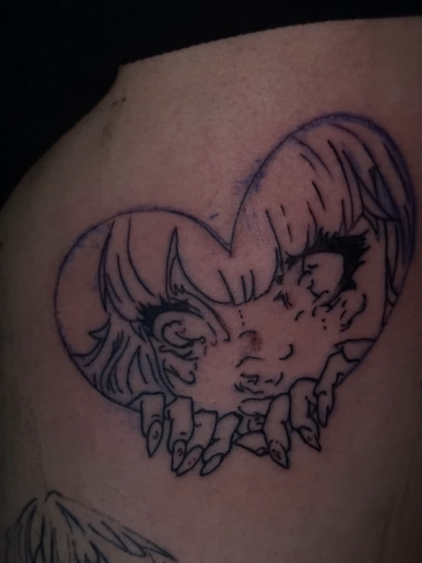 Heart with anime figure and claws, detail