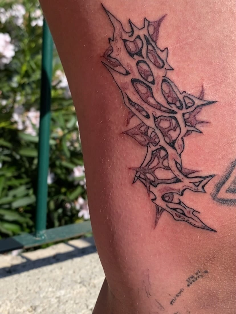 Spiked exoskeletal mass on the upper arm, fresh