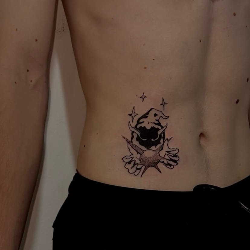 Imp holding an orb on the stomach, healed